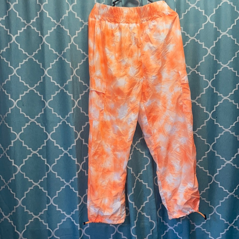 Orange tie dye cargo pants